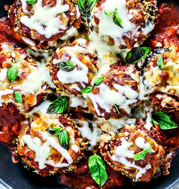 Saucy and cheesy eggplant parmesan in a skillet.