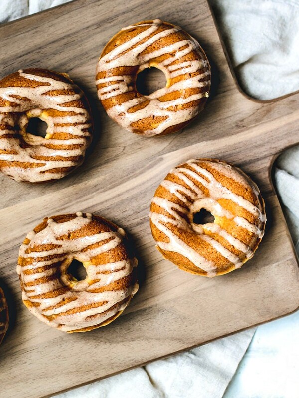 Eggnog donuts drizzled with glaze.