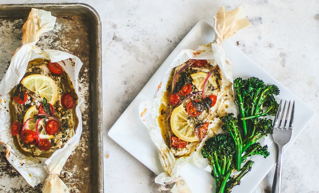 Baked flounder in parchment, cooked and plated.