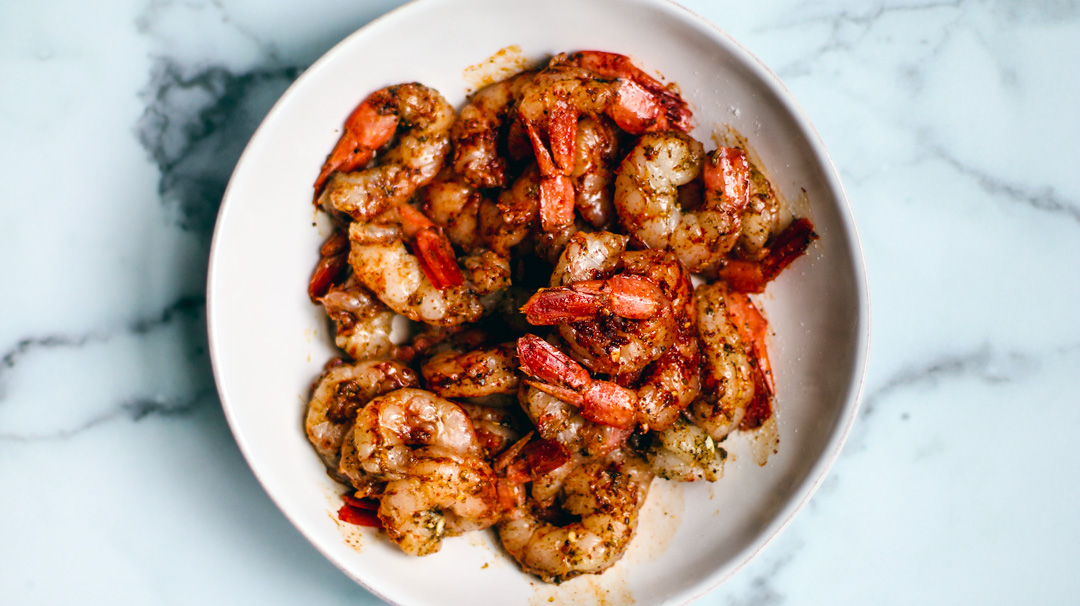 Bowl of marinated shrimp.