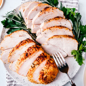 Oven-roasted turkey breast on a serving platter.