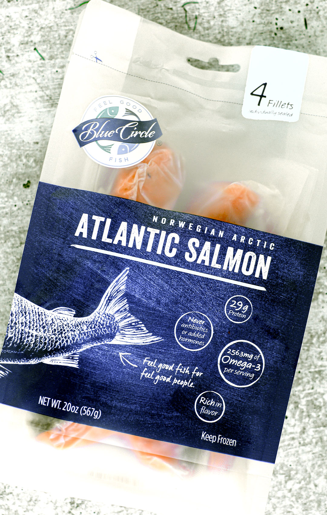 A sealed package of Blue Circle Foods Atlantic Salmon fillets.