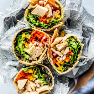 Overhead shot of colorful veggie-filled tuna wraps.