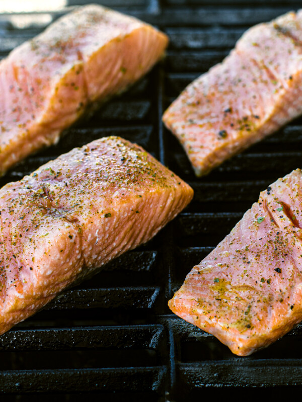 Salmon fillets on a grill.