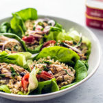 Side close up of serving bowl full of Mediterranean mackerel lettuce wraps.