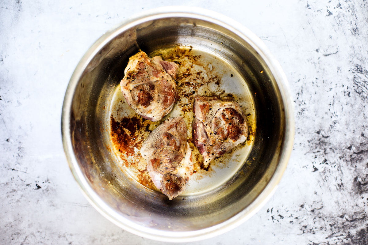 Seared browned pork in Instant Pot.