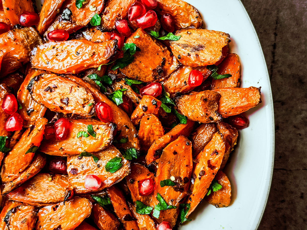 Serving bowl full of carrots.