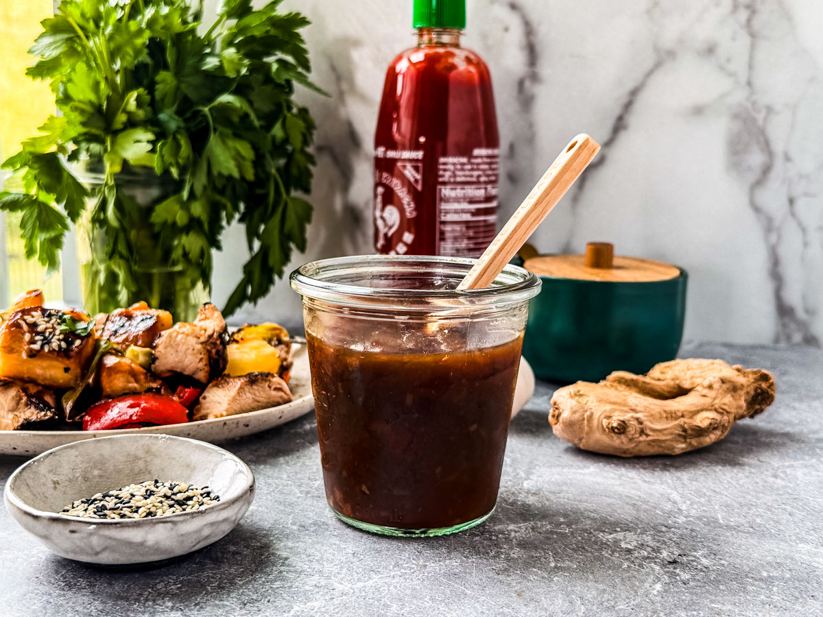 Sauce on a countertop in a jar.