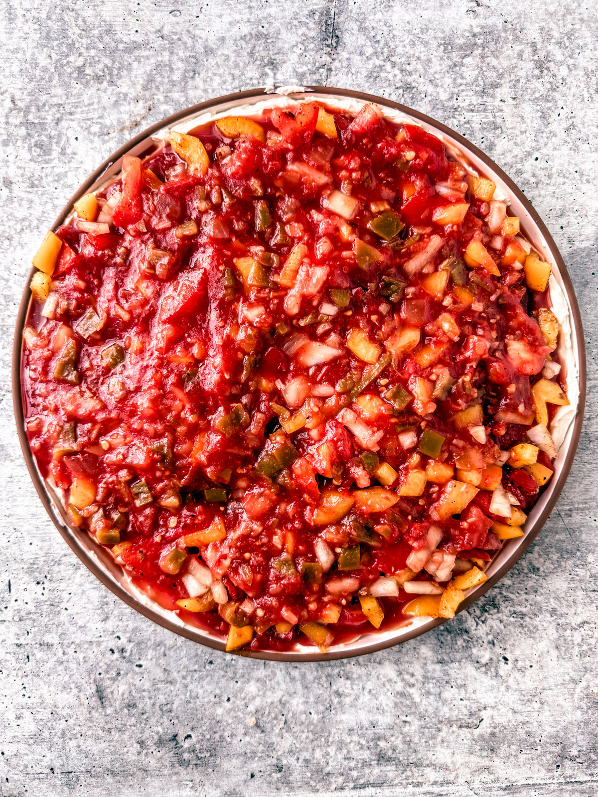 Dip layered with salsa.