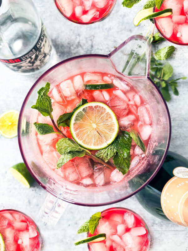 Pitcher of watermelon sangria with lime and mint.