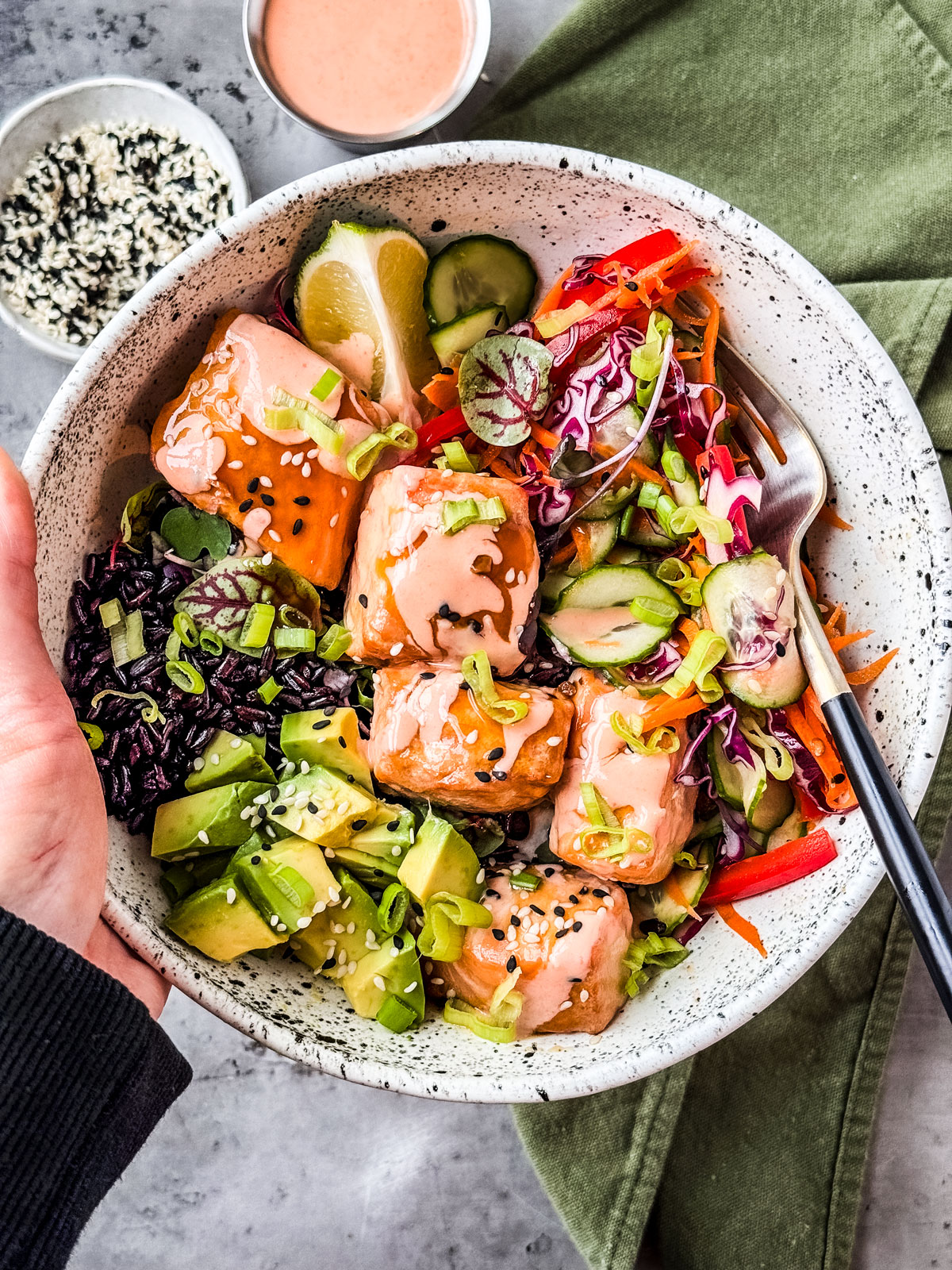 Teriyaki salmon bowl assembled and ready to be eaten.