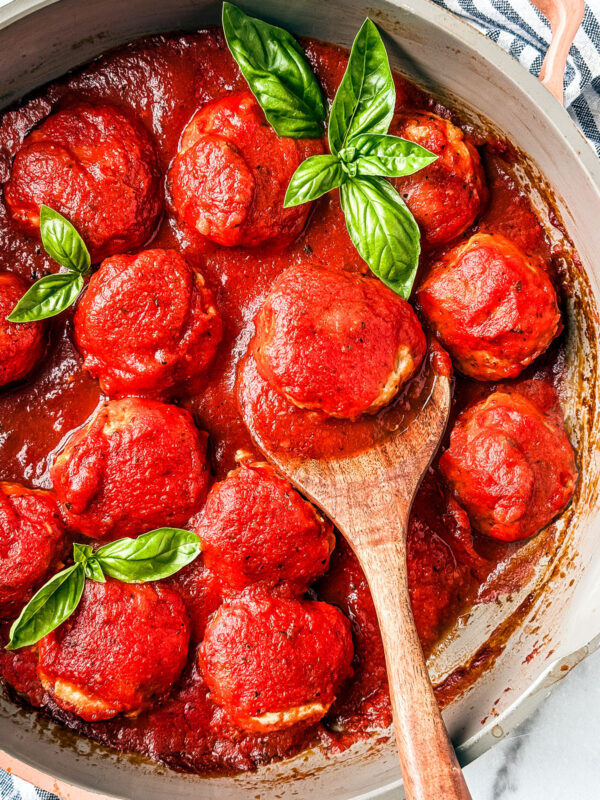 Saucy meatballs in a skillet.