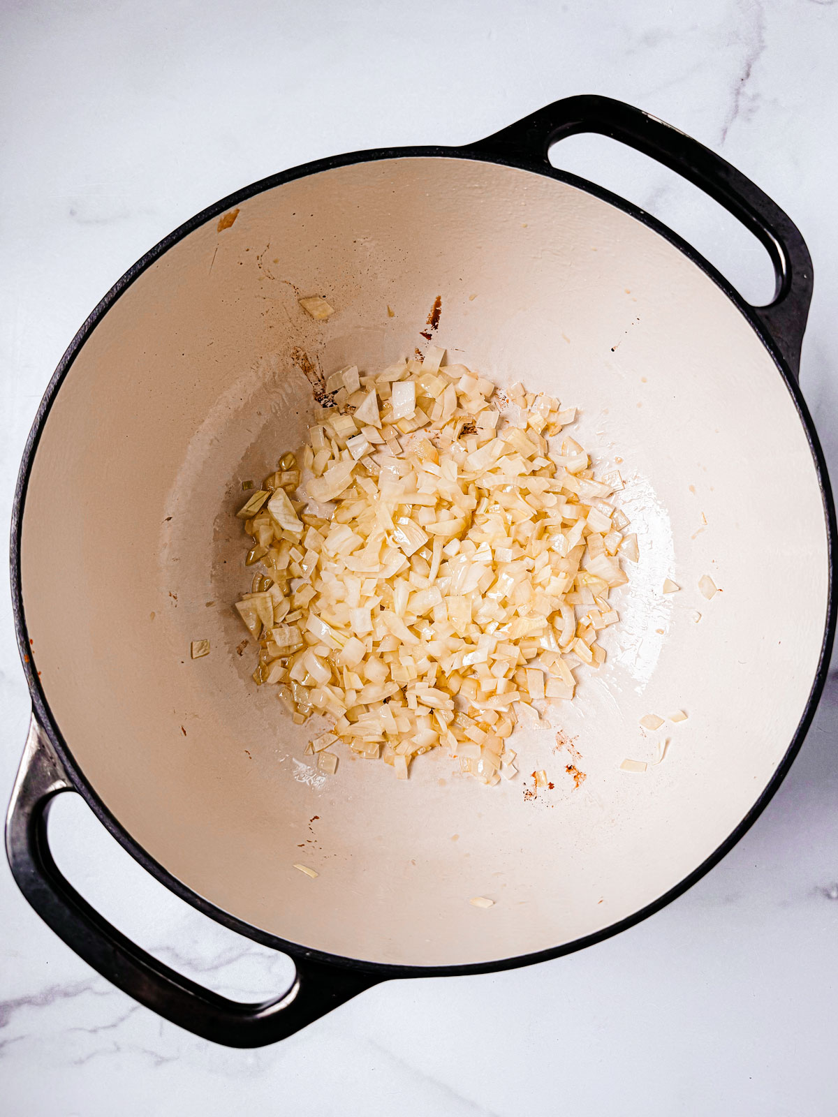 Cooked onions in a Dutch oven.