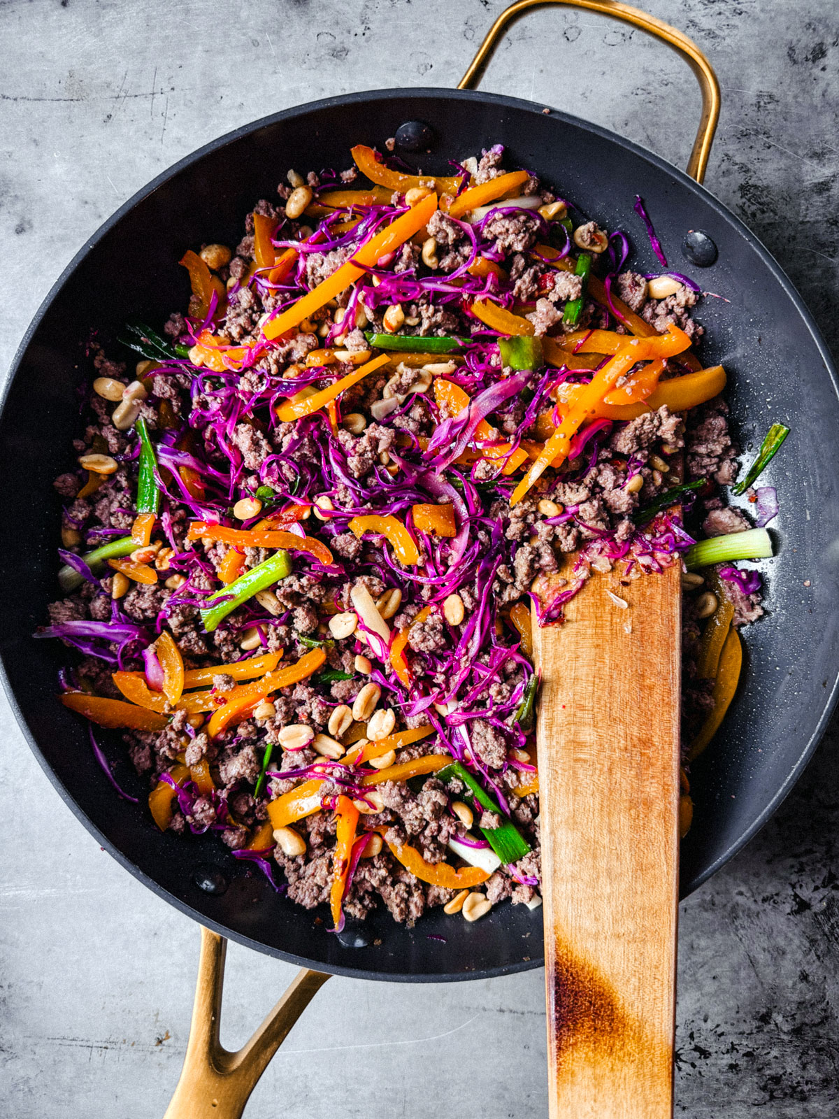 Pan full of ground beef stir fry.